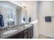 Bathroom featuring double vanity with granite countertops, and walk-in shower at 758 Waterscape Ct, Rock Hill, SC 29730