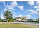 The community center building with landscaping and ample parking under a bright sky at 758 Waterscape Ct, Rock Hill, SC 29730