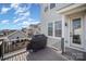 A large deck featuring a grill and view of the surrounding homes at 758 Waterscape Ct, Rock Hill, SC 29730