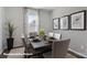 Tastefully decorated dining area featuring a long table, chairs, and plant accents at 8051 Plymouth Dr, Sherrills Ford, NC 28673