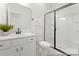 Stylish bathroom with a single sink, a framed mirror, and a modern walk-in shower at 810 Gondola Ct # 136P, Salisbury, NC 28144