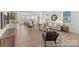 Bright and airy living space showcasing an open floor plan, hardwood floors, and contemporary furnishings at 810 Gondola Ct # 136P, Salisbury, NC 28144