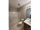 Upstairs bathroom featuring a sink and vanity combo and shower/tub combination at 9130 Charminster Ct, Charlotte, NC 28269