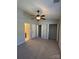 Bedroom with carpet, closet and ceiling fan at 9130 Charminster Ct, Charlotte, NC 28269