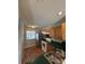 Functional kitchen featuring wood cabinets and stainless steel refrigerator, perfect for meal preparation at 9130 Charminster Ct, Charlotte, NC 28269