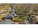 An aerial view of a residential neighborhood with mature trees and well-maintained homes, offering a peaceful suburban setting at 9418 Stately Oak Ln, Mint Hill, NC 28227