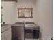 Laundry room featuring ornate mirror above the washer and dryer at 9786 Verdun Ct, Fort Mill, SC 29707