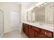 Bathroom features a double sink vanity and a walk-in closet at 1005 Sweetleaf Dr, Fort Mill, SC 29707