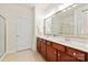 Bathroom features a double sink vanity, and a glass-enclosed shower at 1005 Sweetleaf Dr, Fort Mill, SC 29707