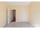 Carpeted bedroom with neutral paint and a closet at 1005 Sweetleaf Dr, Fort Mill, SC 29707