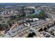 Aerial view of community amenities including lake access, clubhouse, pool and parking at 1005 Sweetleaf Dr, Fort Mill, SC 29707