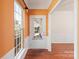 View of entry way with hardwood floors, white trim and a large window providing plenty of light at 1005 Sweetleaf Dr, Fort Mill, SC 29707