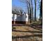 View of the back side of a home and the backyard at 1027 Morningside Park Dr, Gastonia, NC 28054