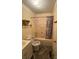 Cozy bathroom with a tub/shower combo and a tile floor at 1027 Morningside Park Dr, Gastonia, NC 28054