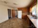 A functional kitchen featuring wood cabinetry with natural lighting at 1027 Morningside Park Dr, Gastonia, NC 28054