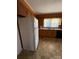 Modest kitchen featuring wood cabinetry and laminate countertops, ready for updates at 1027 Morningside Park Dr, Gastonia, NC 28054