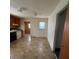 Kitchen with cabinets, stove and view to connecting rooms at 1027 Morningside Park Dr, Gastonia, NC 28054