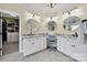 Updated bathroom features a double vanity, granite countertops and a walk-in closet at 1569 Benjamen Latrobe Cir, Fort Mill, SC 29708