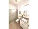 Bathroom featuring a glass shower, granite countertop, and round mirror at 1569 Benjamen Latrobe Cir, Fort Mill, SC 29708