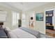Bedroom view showcasing ensuite bathroom access and an abundance of natural light at 1569 Benjamen Latrobe Cir, Fort Mill, SC 29708
