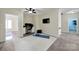 Bonus room with neutral walls, a ceiling fan, and an adjoined home office space at 1569 Benjamen Latrobe Cir, Fort Mill, SC 29708