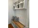 Mudroom with white cabinets, wood bench, and overhead cubbies at 1569 Benjamen Latrobe Cir, Fort Mill, SC 29708