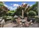 View of the backyard from the wooden patio, including a small outdoor table at 1569 Benjamen Latrobe Cir, Fort Mill, SC 29708