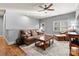 Inviting living room with hardwood floors, traditional-style furnishings, and plenty of natural light at 188 Winding Forest Dr, Troutman, NC 28166