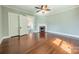 Bright bedroom features hardwood floors and classic fireplace at 234 N Race St, Statesville, NC 28677