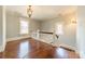 Upstairs hallway boasts gleaming wooden floors, and beautiful views at 234 N Race St, Statesville, NC 28677