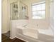 Bathroom with separate jetted tub and glass enclosed shower at 2518 Eargle Rd, Charlotte, NC 28269