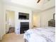 Relaxing main bedroom with en-suite bath, television and modern decor at 2518 Eargle Rd, Charlotte, NC 28269