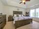 Spacious main bedroom boasts a tray ceiling, neutral colors, and generous natural light at 2518 Eargle Rd, Charlotte, NC 28269