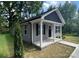 Charming single-story home with gray siding, black shutters, and a welcoming front porch at 347 Sidney St, Rock Hill, SC 29730