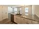 View of kitchen and living room featuring granite countertops and stainless steel appliances at 347 Sidney St, Rock Hill, SC 29730