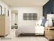 Bedroom featuring wood nightstand, gray upholstered bed frame, and a patterned rug at 4187 Skyboat Cir, Fort Mill, SC 29715