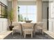 Inviting dining room featuring modern chairs, a round table, and large window with natural light at 4187 Skyboat Cir, Fort Mill, SC 29715