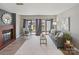 Comfortable living room featuring a cozy seating arrangement, natural light, and decorative fireplace at 419 W 8Th St, Charlotte, NC 28202