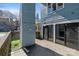 Cozy patio space with string lights, featuring city views and access to sliding glass doors at 419 W 8Th St, Charlotte, NC 28202