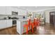 Well-equipped kitchen featuring a center island and stainless steel appliances at 4329 Castleton Rd, Charlotte, NC 28211