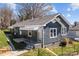 Charming single-story home featuring a landscaped yard and a welcoming front porch at 512 Washington St, Cramerton, NC 28032