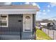 Inviting front entrance with a white screen door, railing and covered porch at 512 Washington St, Cramerton, NC 28032