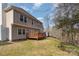 Backyard view of house with wooden deck overlooking the lawn at 6087 Diamond Pl, Harrisburg, NC 28075