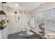 Modern bathroom showcasing a glass shower and elegant fixtures at 6087 Diamond Pl, Harrisburg, NC 28075