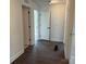 Hallway with hardwood style flooring and white doors at 619 Amberjack Pl, York, SC 29745