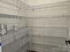 Walk-in pantry with adjustable metal shelving, perfect for organized storage at 619 Amberjack Pl, York, SC 29745