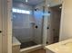 Modern shower featuring gray tile surround, a glass enclosure, and a bench at 619 Amberjack Pl, York, SC 29745