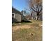 The backyard features a grassy area and trees at 701 Betty St, Gastonia, NC 28054