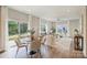 Cozy dining space with sliding glass doors, adjacent to the living area and backyard at 8029 Joy Crossing Ln, Charlotte, NC 28214