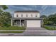 Charming new construction two-story home with a covered porch and a two-car garage at 8029 Joy Crossing Ln, Charlotte, NC 28214